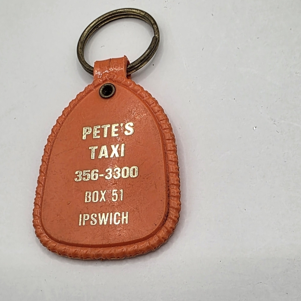 Vintage Pete's Taxi Orange Keychain with Gold Text